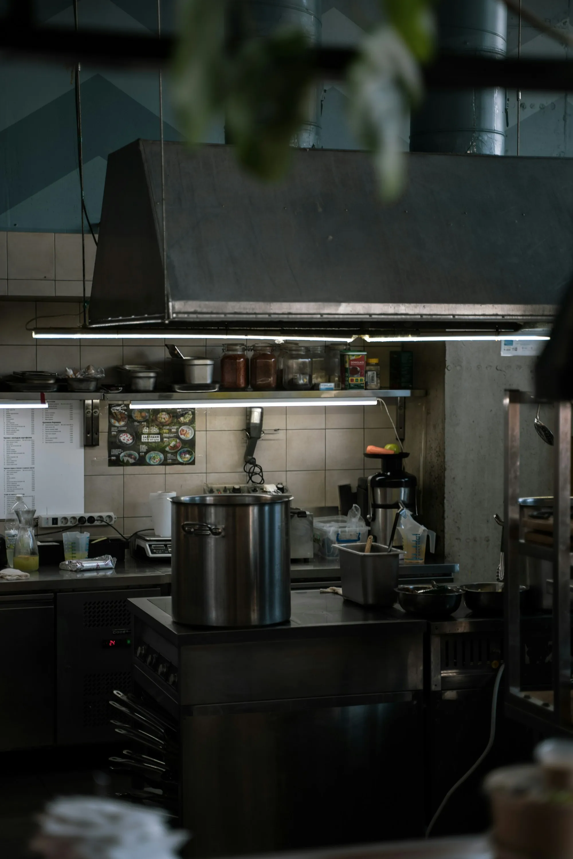 Commercial Water Filtration in Lake Forest, CA Stainless steel pot on the stove of a restaurant kitchen